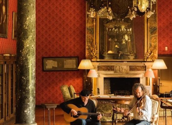 Musicians; Dennis Cahil and Martin Hayes, performing in Bantry House as part of Masters of Tradition 2017.