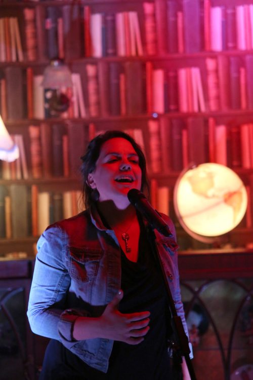 Erin Fornoff at The Word, an evening of spoken word and performance poetry hosted by poet and artist Roger Hudson at THE LIVING ROOM AT SARSFIELD’S BAR.

Photo-Jenny Matthews