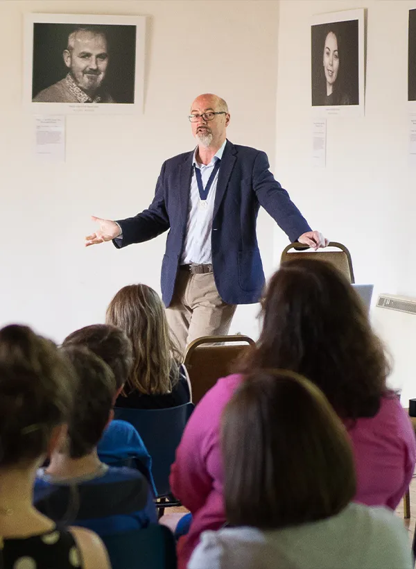 Man giving a lecture