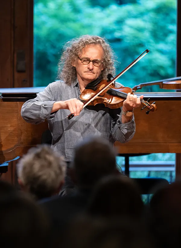 Martin on stage playing violin