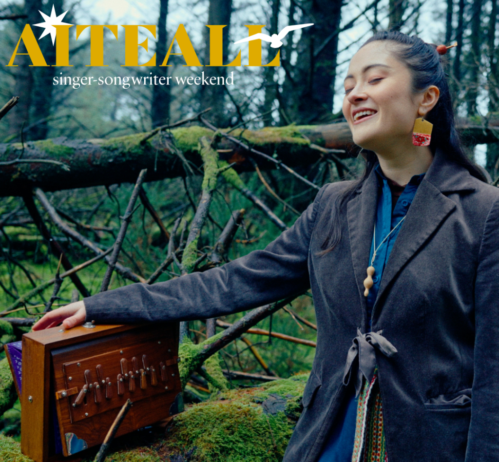 Photo of Amano in a forest with Aiteall logo in corner