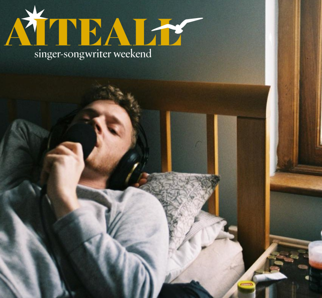 Isaac Jones with Aiteall logo