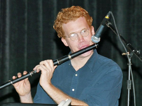 A photo of Brendan Dolan playing the flute