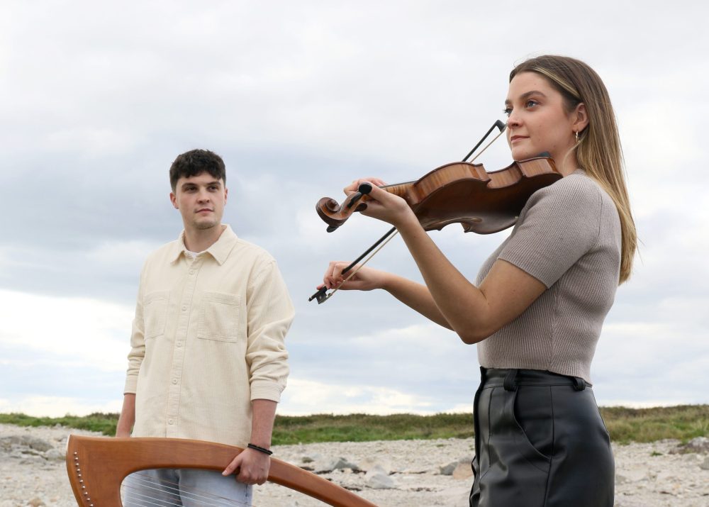 A photo of musicians Seamus and Caoimhe Uí Fhlatharta
