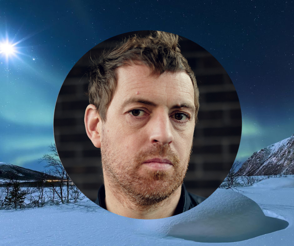 Photo of writer Adrian Duncan in a circular window effect with a snowy winter scene behind the circle. The idea is to create a sense of an Advent Calendar window